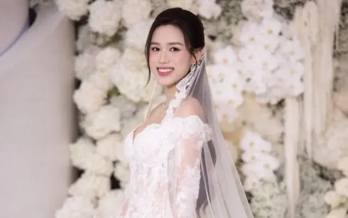 Visual 'đẹp không góc chết' của Hoa hậu Đỗ Thị Hà trong tiệc cưới ở Hà Nội